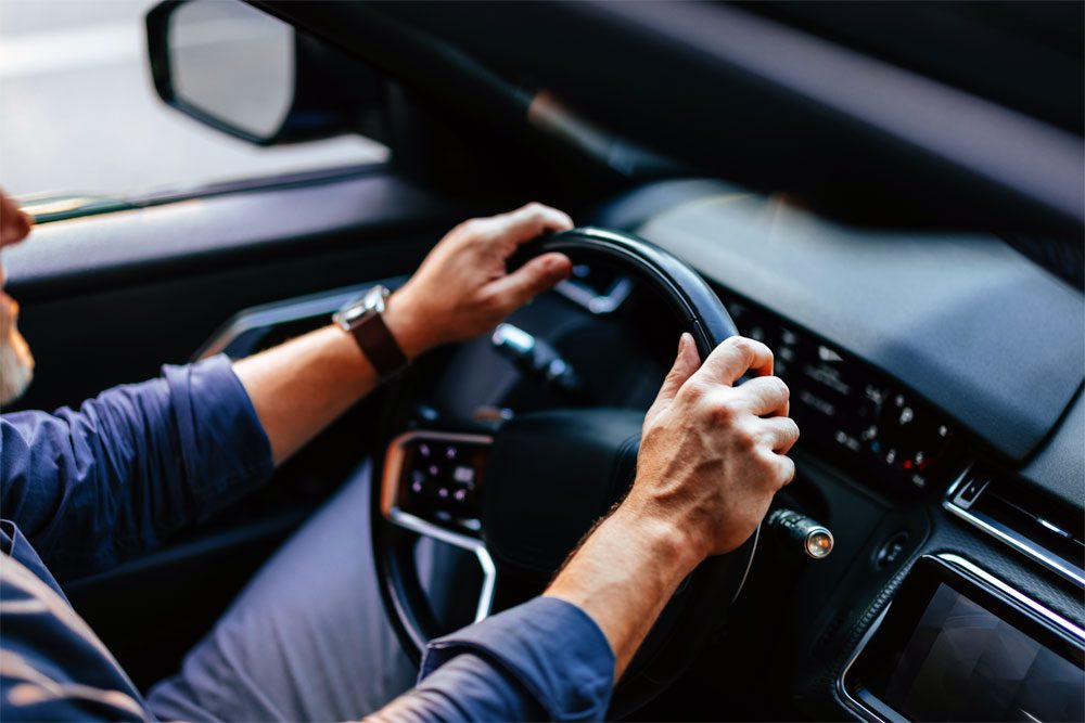 Image of a person driving a vehicle