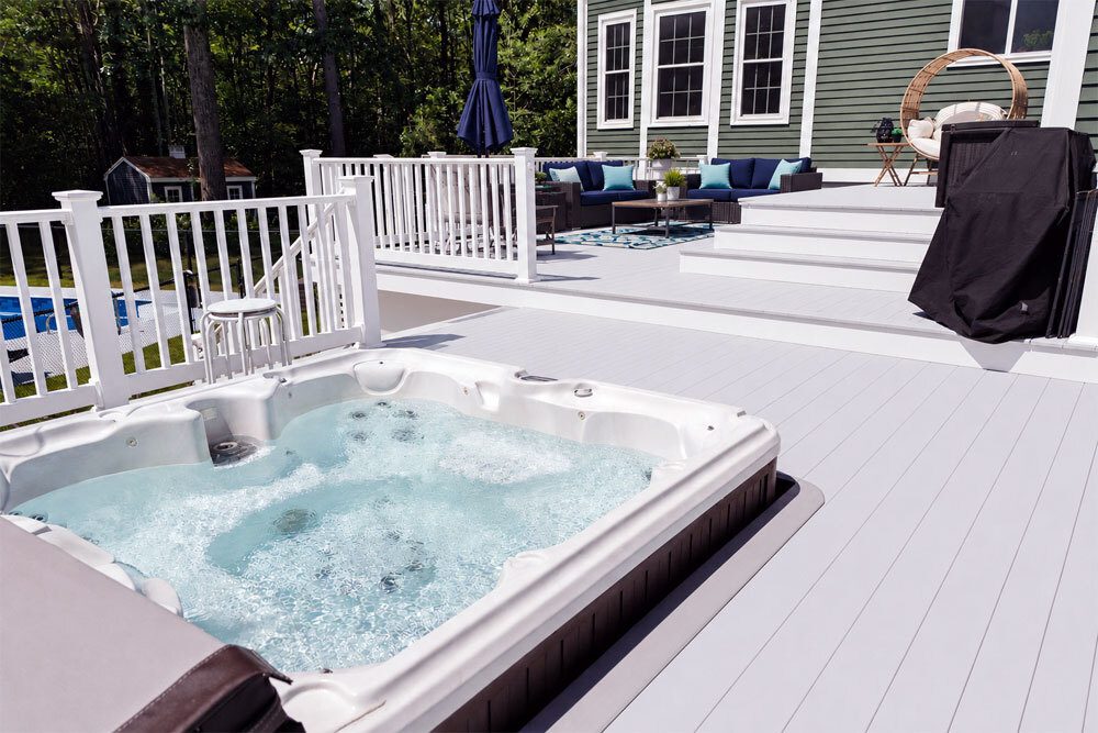 Gilbert-Blog-Featured-Image-Home-Insurance-For-Your-Backyard Image of a backyard hot tub on an outdoor deck