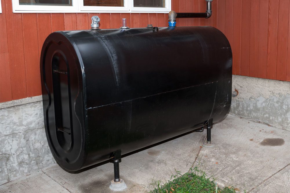 Gilbert-Blog-Featured-Image-Does-Home-Insurance-Cover-Oil-Tanks-Updated Image of a home oil tank for heating