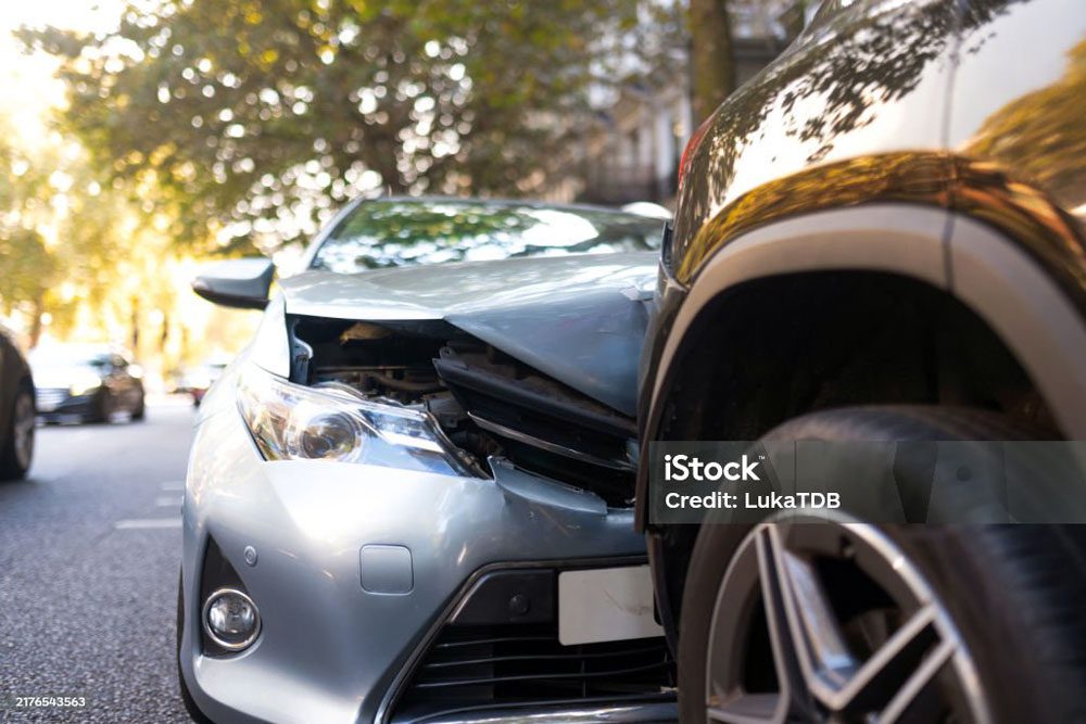 Image of two cars crashed into each other